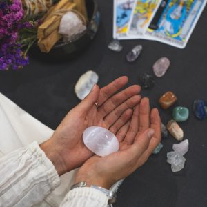 woman holding crystals